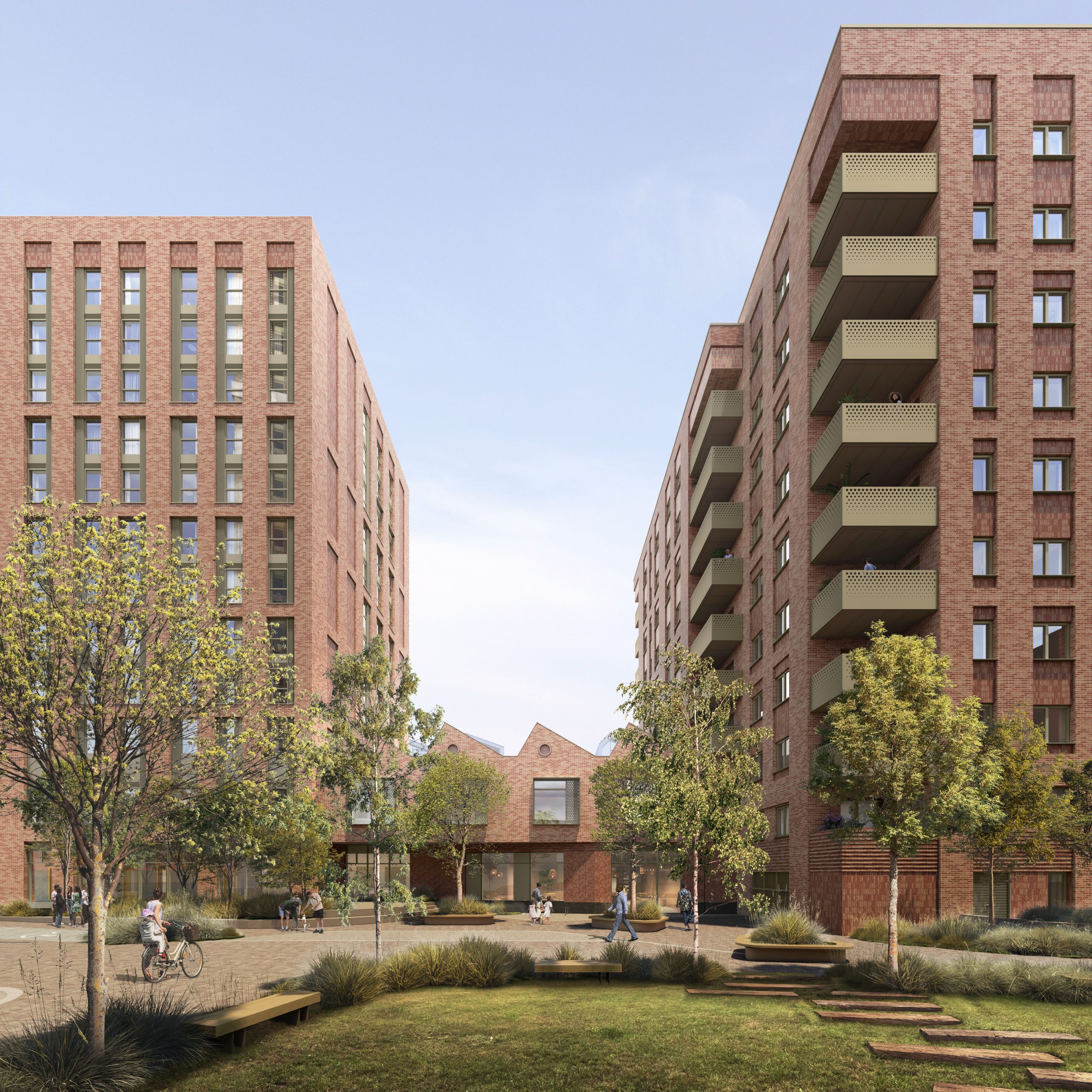 View east towards the two-storey affordable workspace, with its sawtooth roof reflecting the site’s industrial heritage and creating a more open, connected public realm.